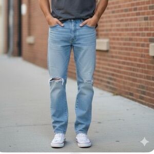 34/29 Wrangler Authentic Premium Quality Blue Jeans - distressed